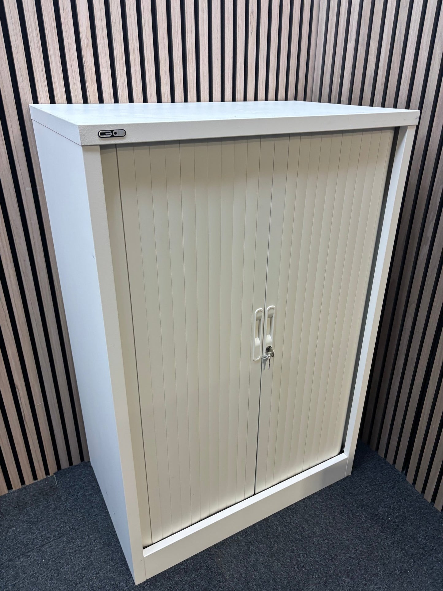 Medium white metal side open tambour unit with 1 no. shelf and key 120Hx80Wx49D