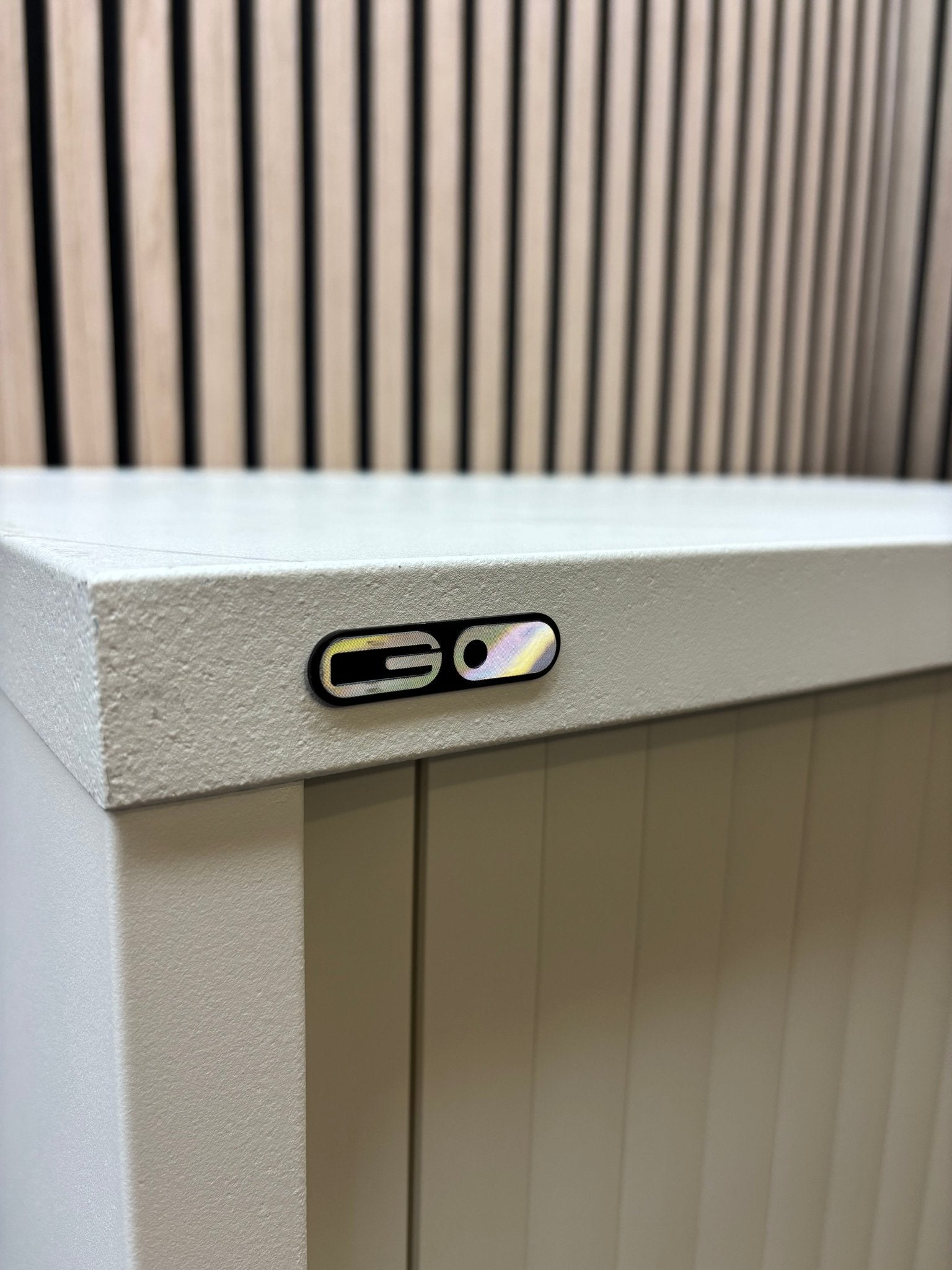 Medium white metal side open tambour unit with 1 no. shelf and key 120Hx80Wx49D
