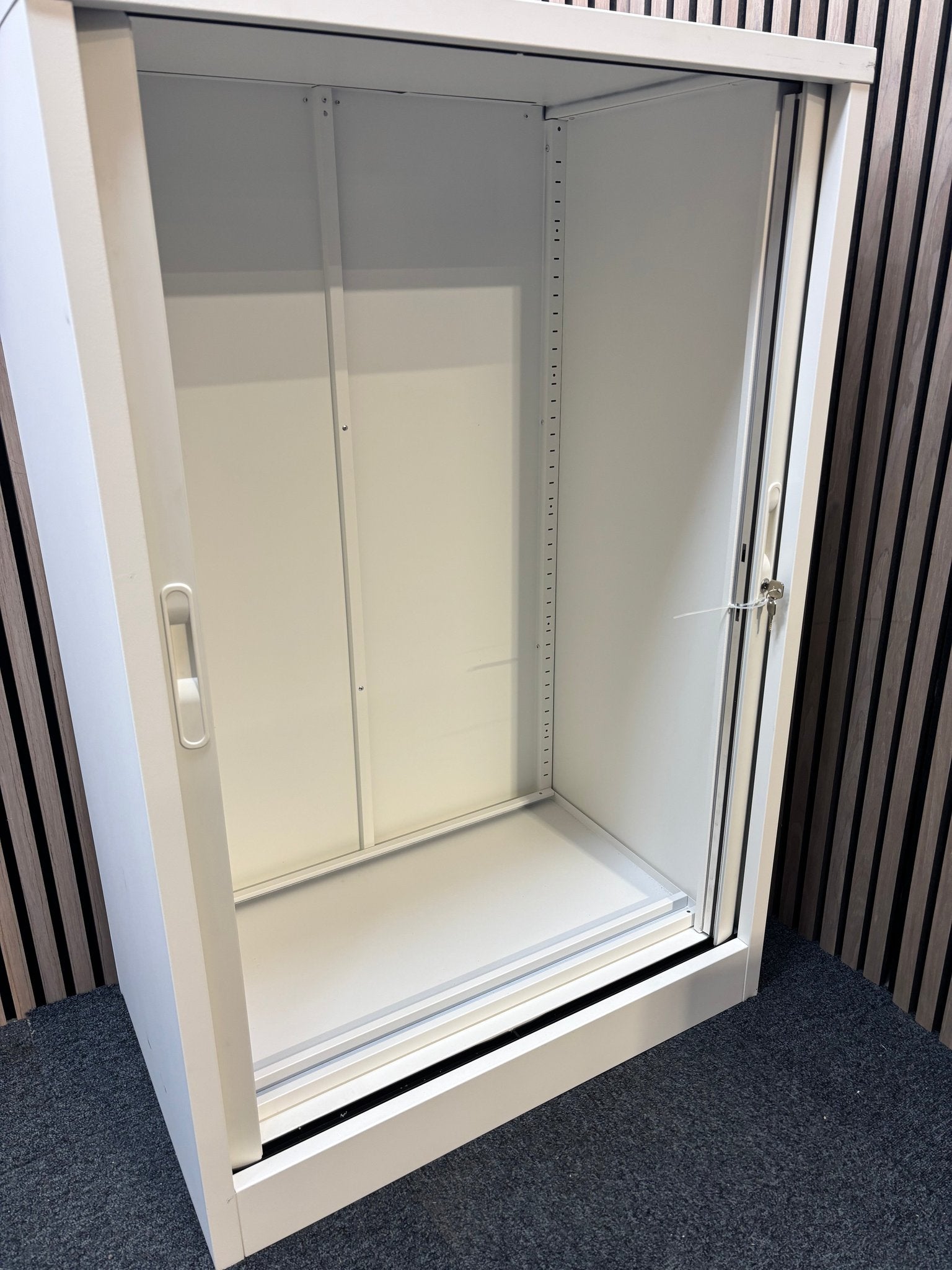 Medium white metal side open tambour unit with 1 no. shelf and key 120Hx80Wx49D