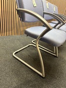 Light blue fabric solid metal framed meeting chair with arms