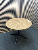 Round cafe table with wood-effect top and black metal base.  J3943