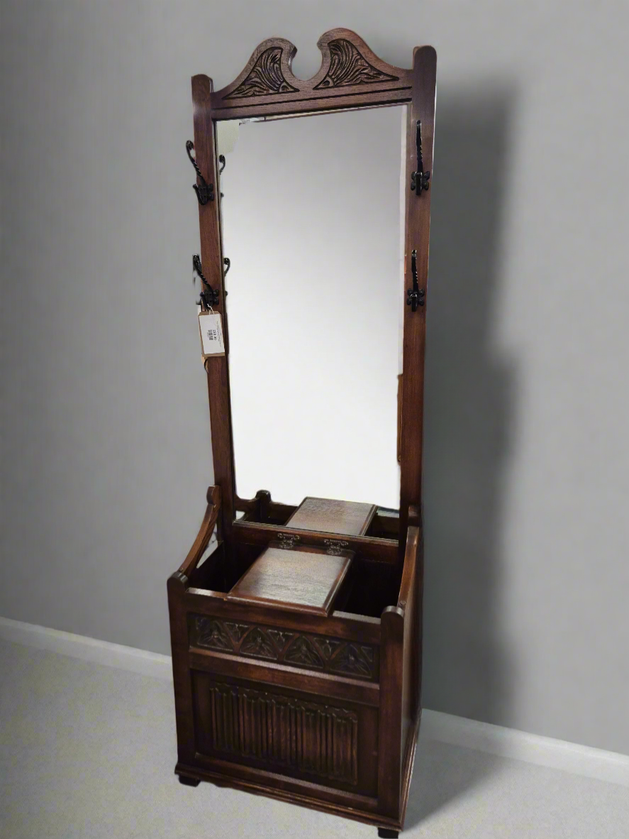 Ornate stained solid oak stained tall hall hat and coat stand with mirror and hooks