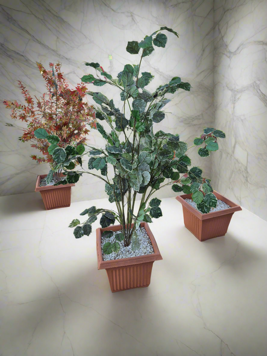 Artifical plant in terracotta effect pot