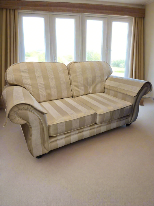 2 seater Finline roll back sofa in cream stripe fabric with brass castor legs  2125