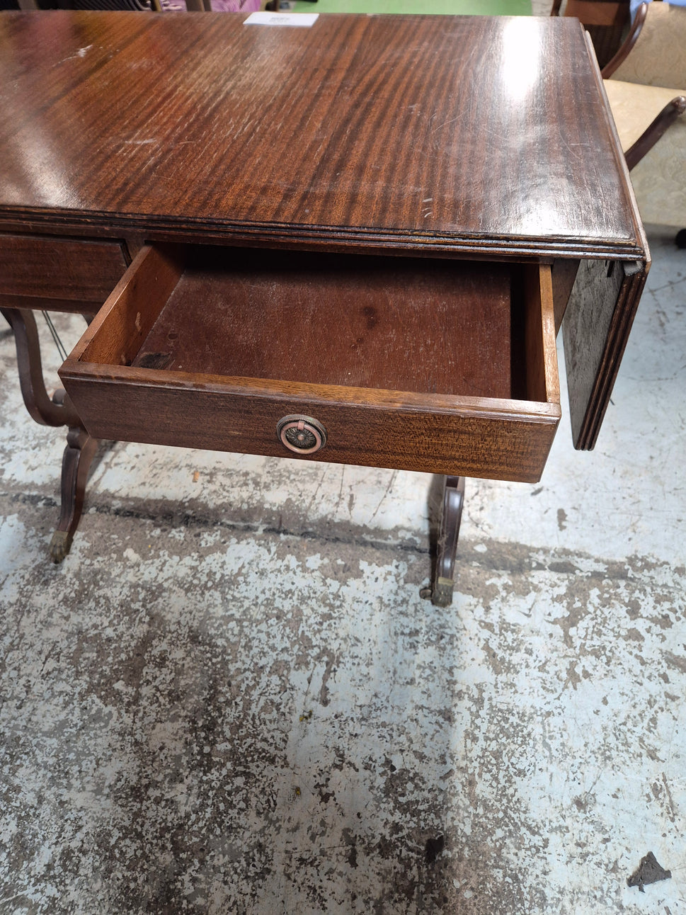 Mahogany drop leaf table on castors 2125