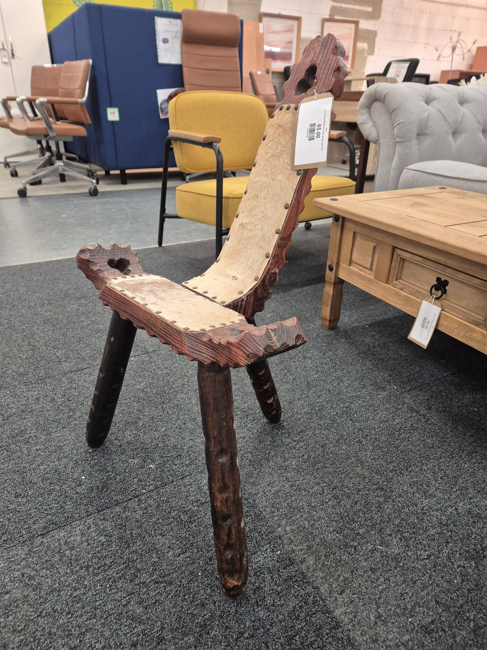 Ornate pine stained stool with calf skin seat 2125