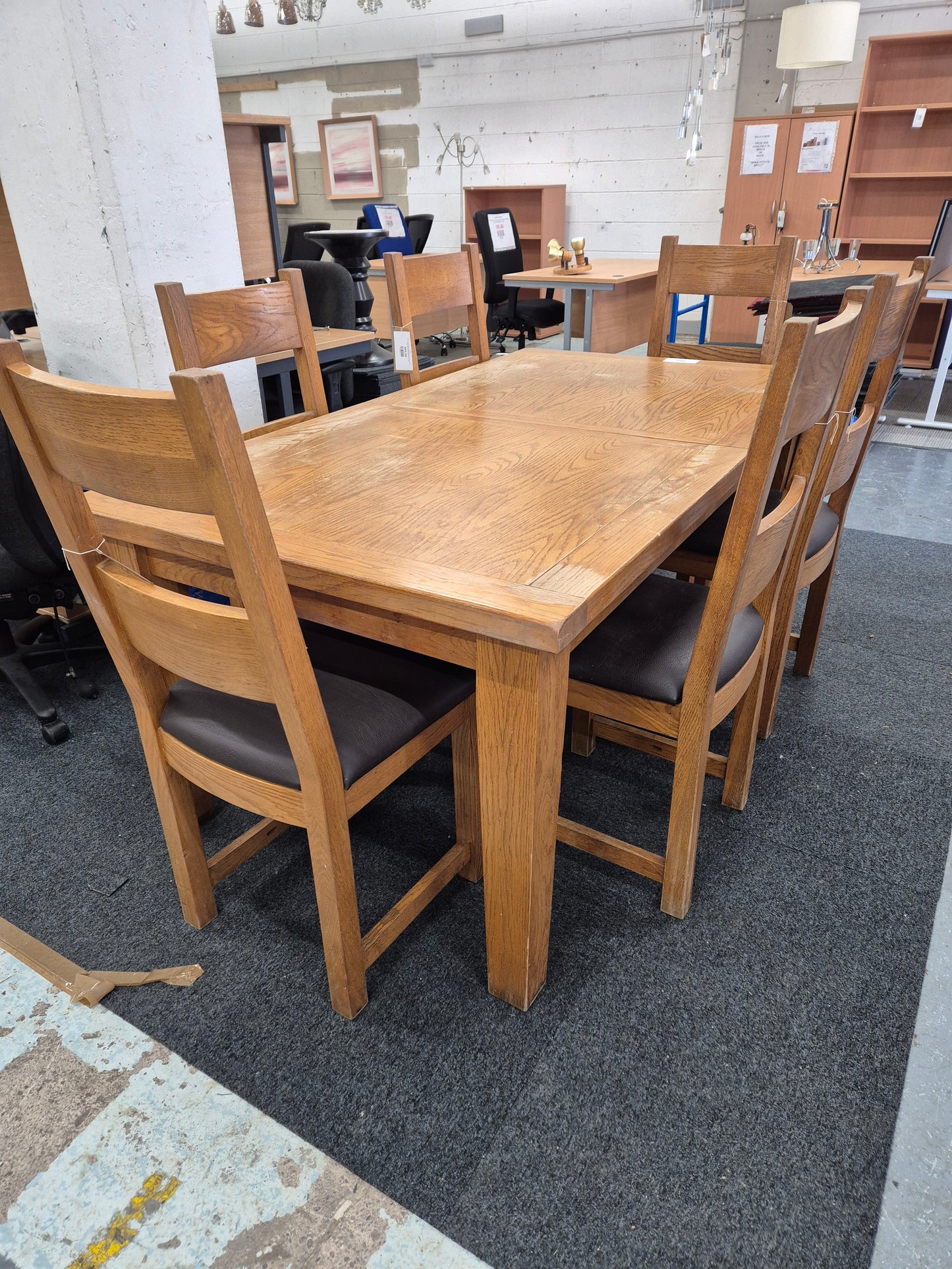 Solid oak extendable dining table with 6 no. matching chairs with brown leatherette seat%A0 2125
