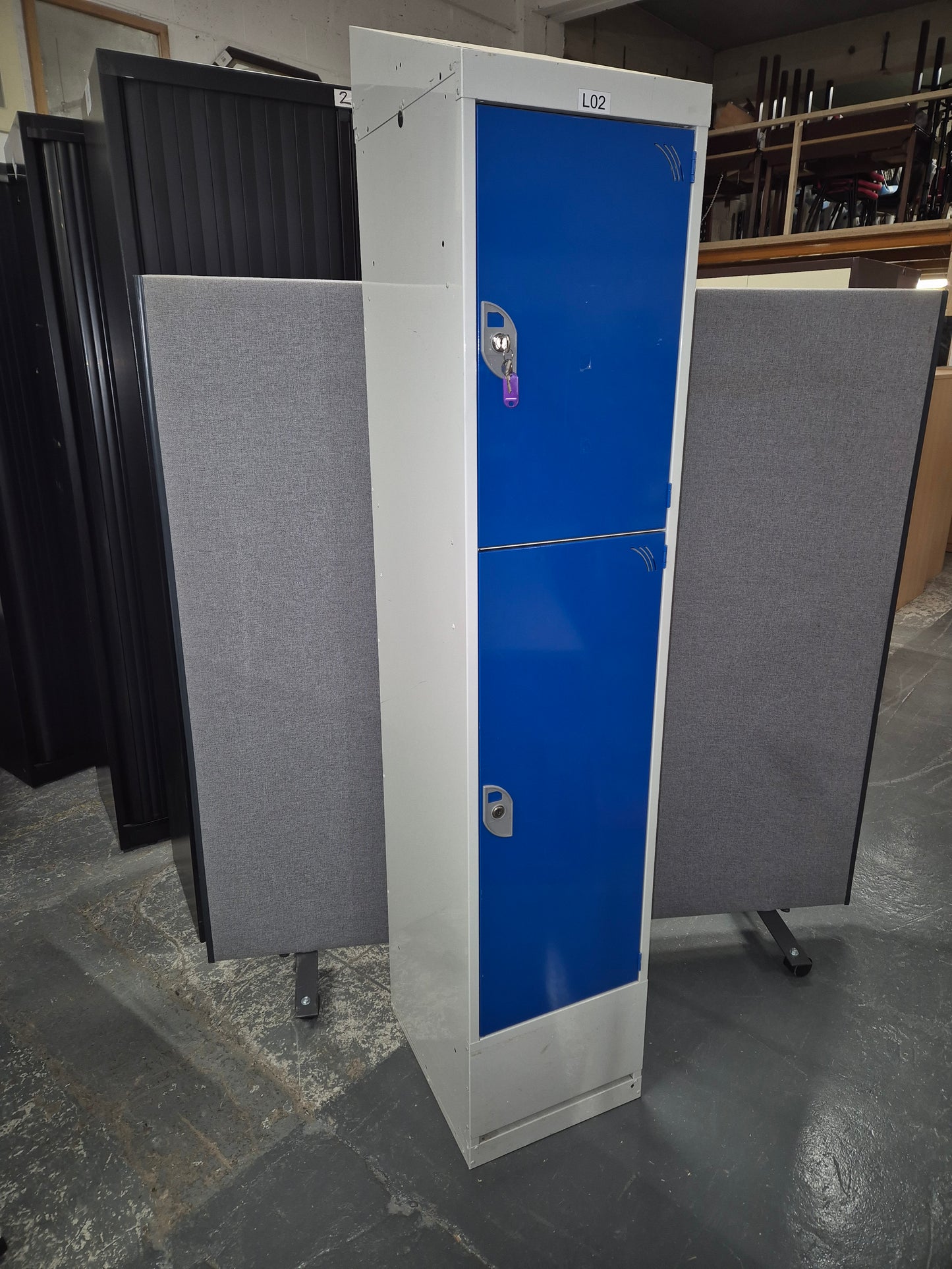 Tall 2 door personal locker, grey metal carcass with blue doors complete with keys