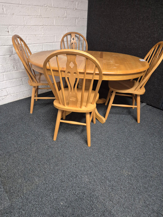 Circular rubberwood extendable dining table withe central base and 4 no. matching chairs 1225