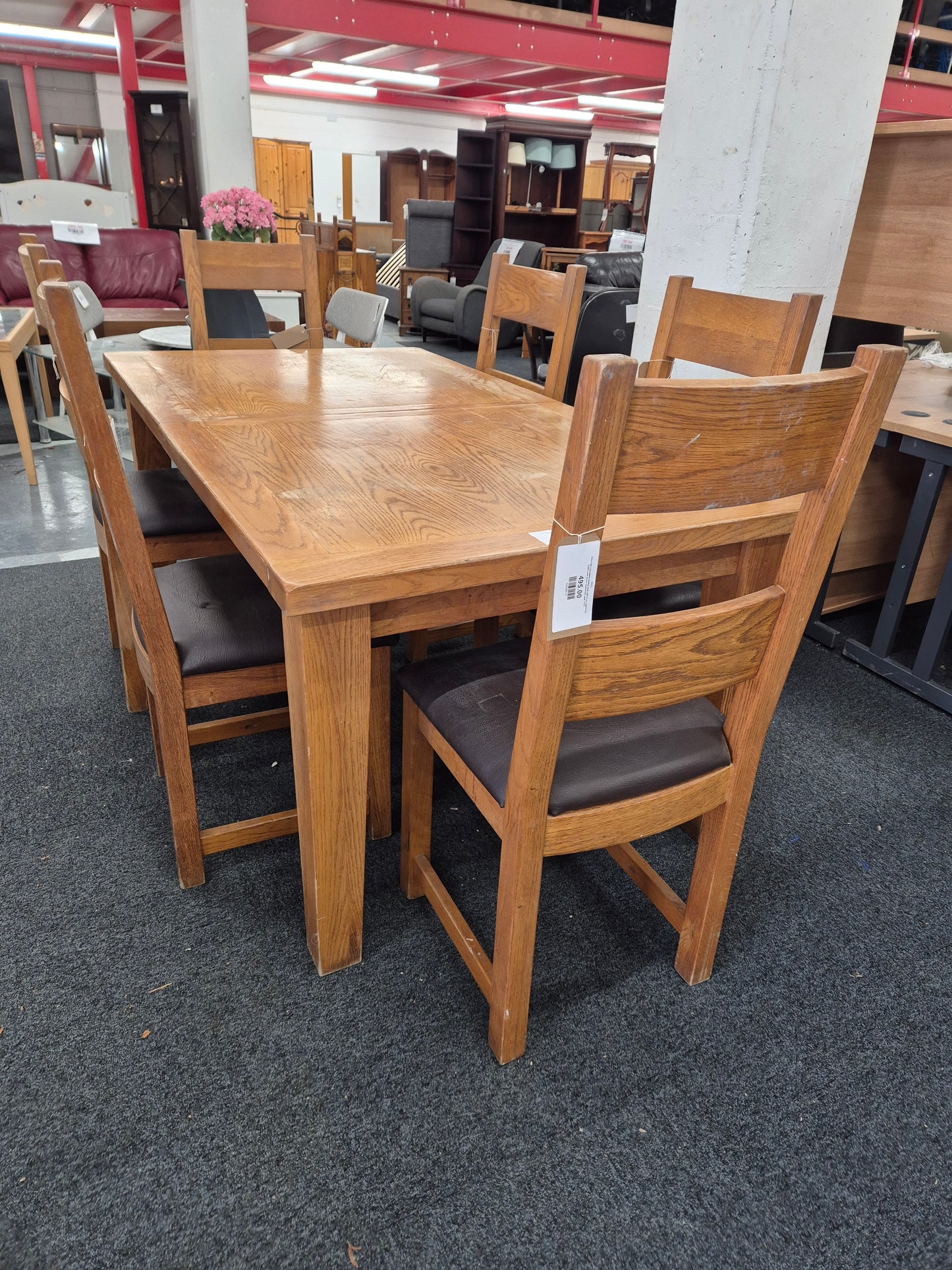 Solid oak extendable dining table with 6 no. matching chairs with brown leatherette seat%A0 2125