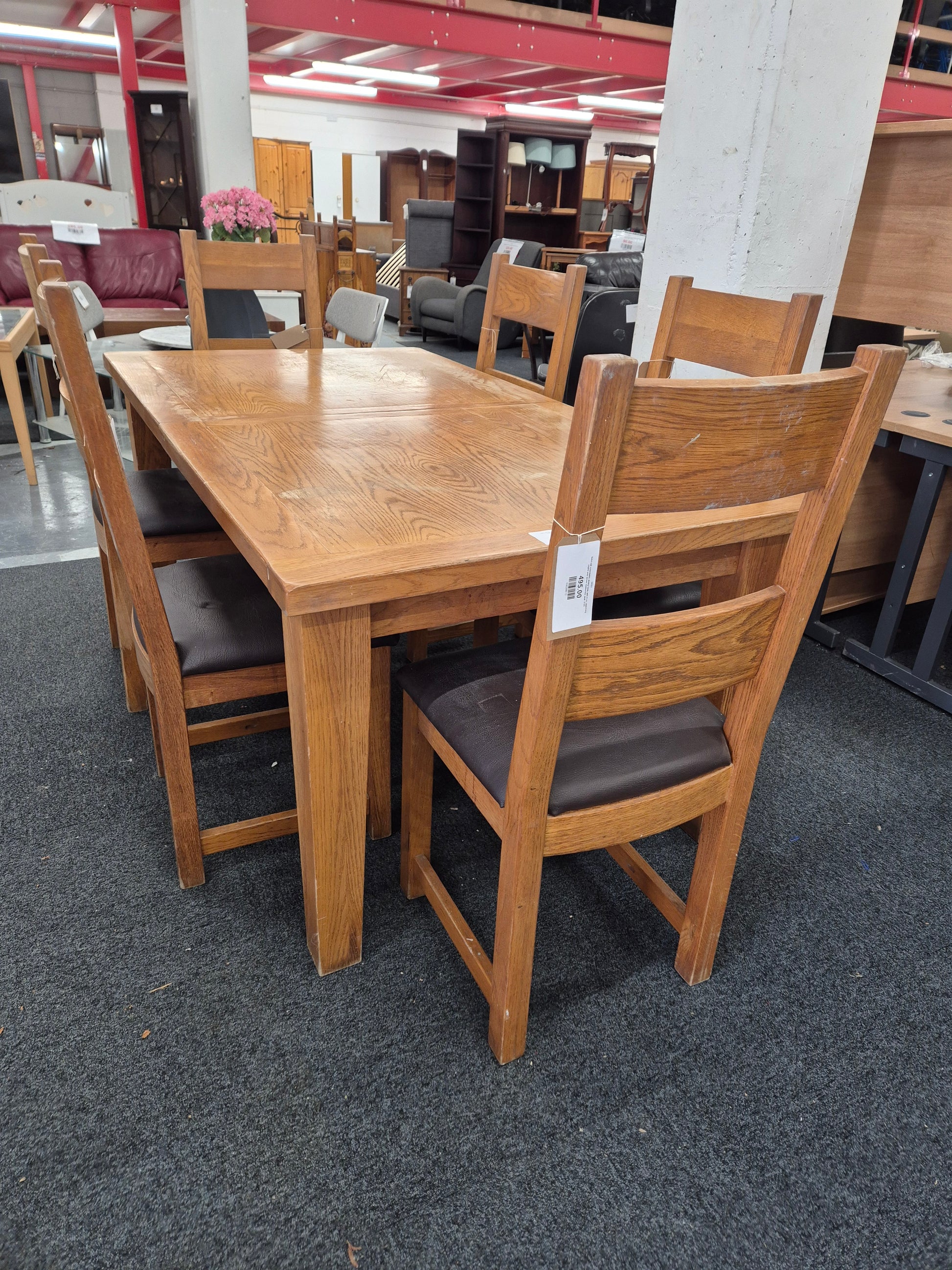 Solid oak extendable dining table with 6 no. matching chairs with brown leatherette seat%A0 2125