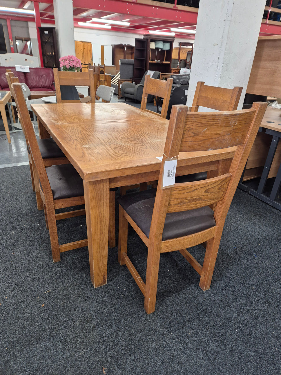Solid oak extendable dining table with 6 no. matching chairs with brown leatherette seat%A0 2125