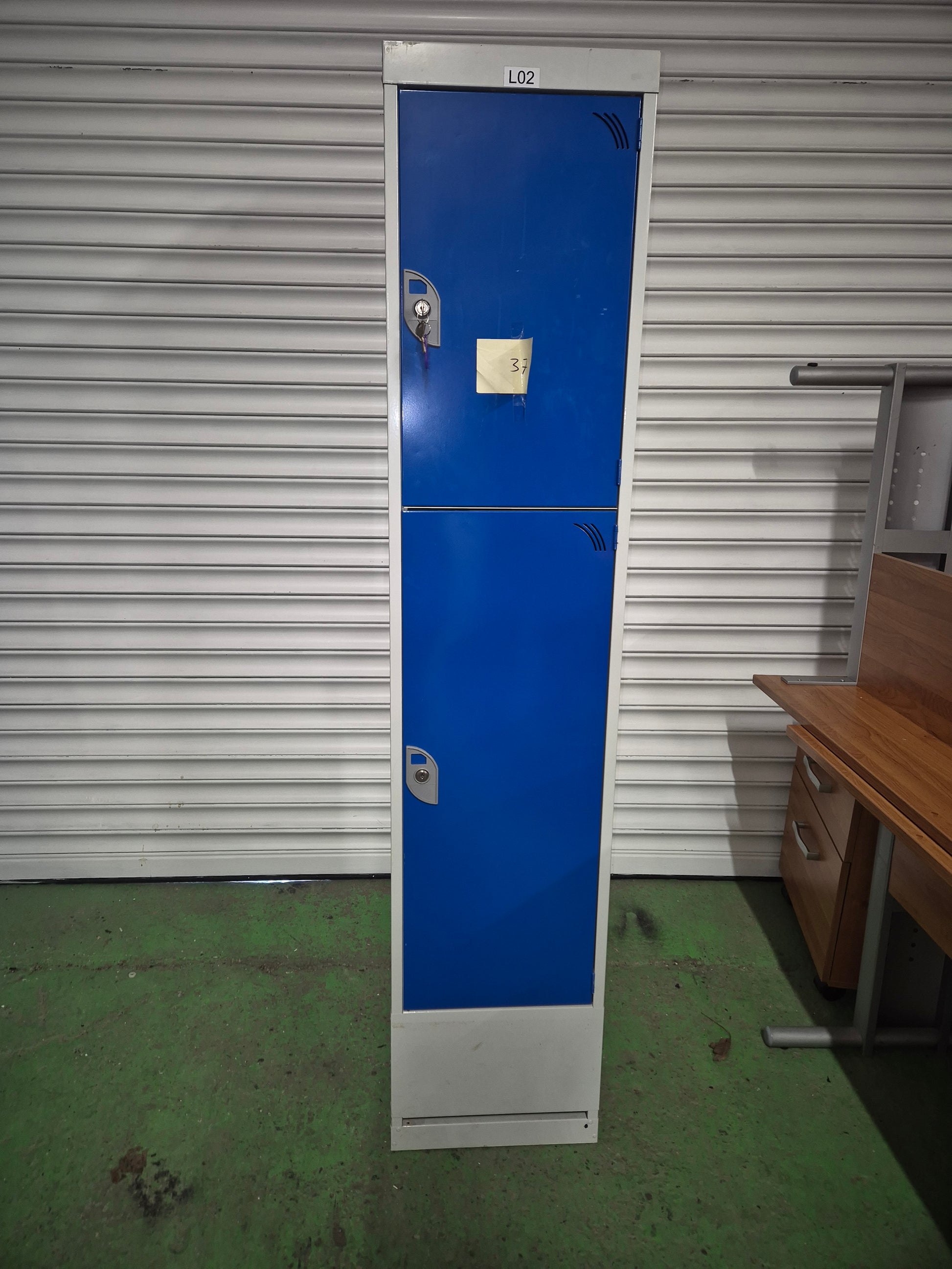 Tall 2 door personal locker, grey metal carcass with blue doors complete with keys
